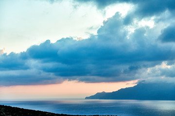 dawn the sea clouds mountains