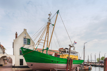Old fishing boat docked in the Dutch village of Urk