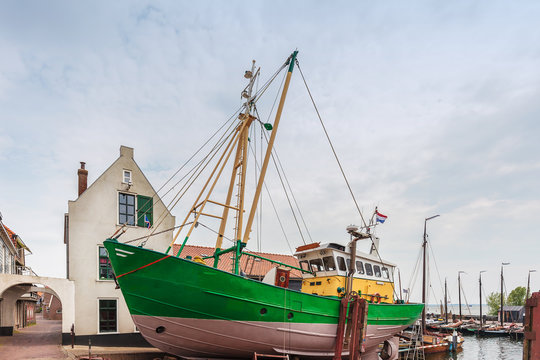 Old fishing boat docked in the Dutch village of Urk