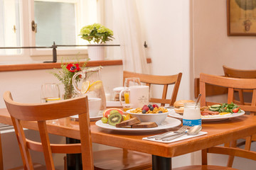 Fresh and tasty breakfast served on the table.