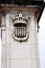 Ornate stonework on a royal wall