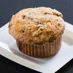 Close up shot of fresh bran muffin without icing