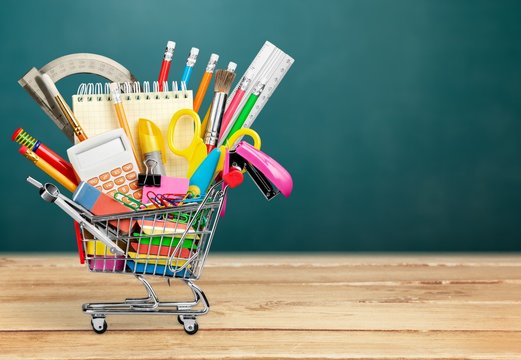 Stationery objects in mini supermarket cart