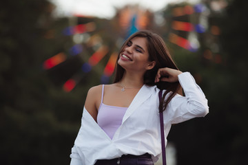 Fototapeta premium Happy woman in lunapark