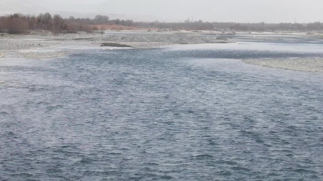 The Chorokhi river, on the border of Georgia and Turkey. Extensive pebbly shoals of the formerly powerful rabid river at the mouth, now overregulated by dams
