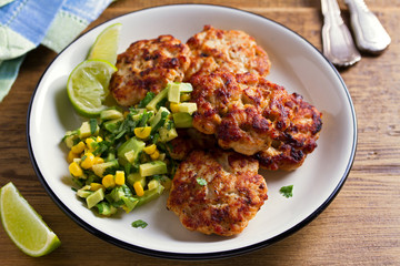 Chicken patties or  burgers with avocado corn salsa