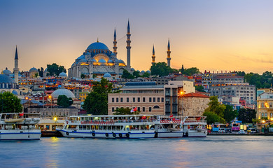 July 20, 2018, Sunset in Istanbul, Turkey. View of the Suleymaniye Mosque and Eminony Pier