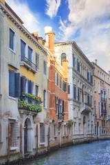 Photo sur Plexiglas Canal Beautiful view of one of the Venetian canals in Venice, Italy