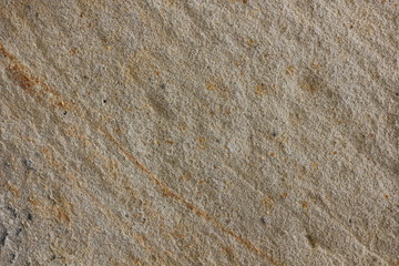 Texture of a stone wall. Vintage background. A wall of medieval buildings. Abstract pattern with a natural material. Blank for design