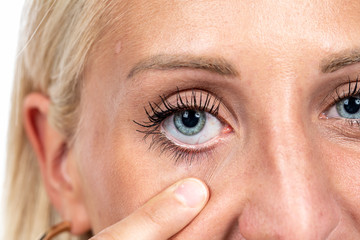 Finger open blue eye