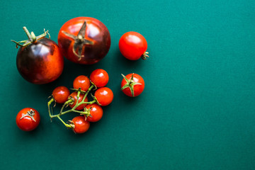 fresh red tomatoes on a blue background