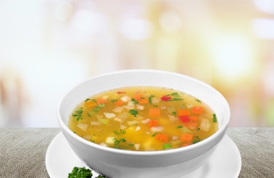 Vegetable soup isolated on a white background