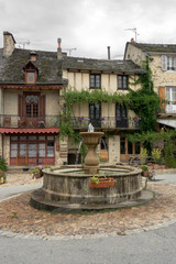 Decorative fountain in a medieval french village
