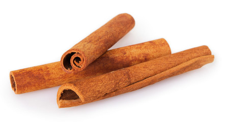 Cinnamon sticks on white background