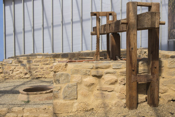 The ancient tradition of grape processing. The squeezer is used to press the wine. Excavation of the civilization of the ancient Greeks. Winery of the 5th century in the ancient fortress in Byala.