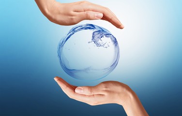 Water figure with human hand isolated