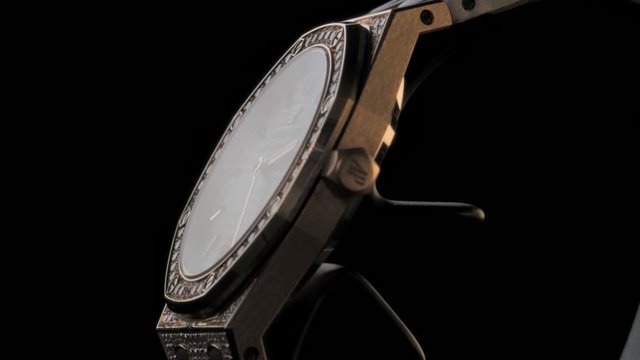 luxury hand watch on black background. Clock details.