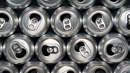 Stack of empty aluminum beer cans, front side view, close up, macro.