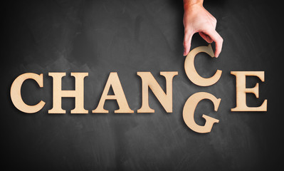 Hand changes one of six letters, turning the word 