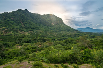 Fototapeta premium Rural landscape among mountains with agriculture among the jungle in Colombia.