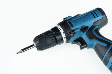charged blue drill screwdriver on white background