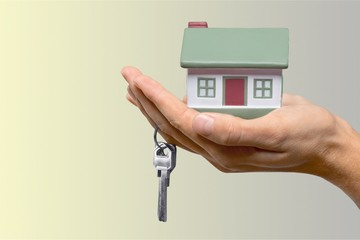 Building, mortgage, real estate and property concept - close up