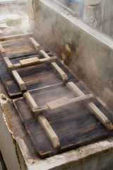Fototapeta na wymiar Kannawa Hot Springs,steamed cooking pot