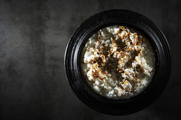 Steamed rice with sesame in pot 