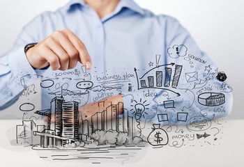 Businessman and  analytics symbols on  background