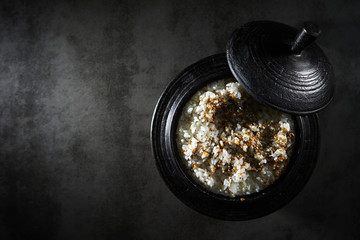 Steamed rice with sesame in pot 