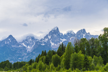 Fototapeta premium grand teton national park on the day with reflection in river.