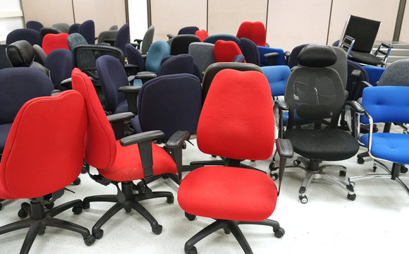 different chairs in the office storage room