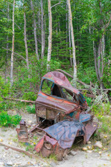 A Rusty Old Truck Along The Alaska HIghway, Canada