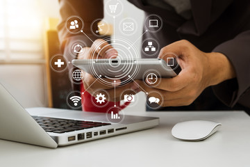 Digital marketing media in virtual screen.businesswoman hand working with mobile phone and modern...