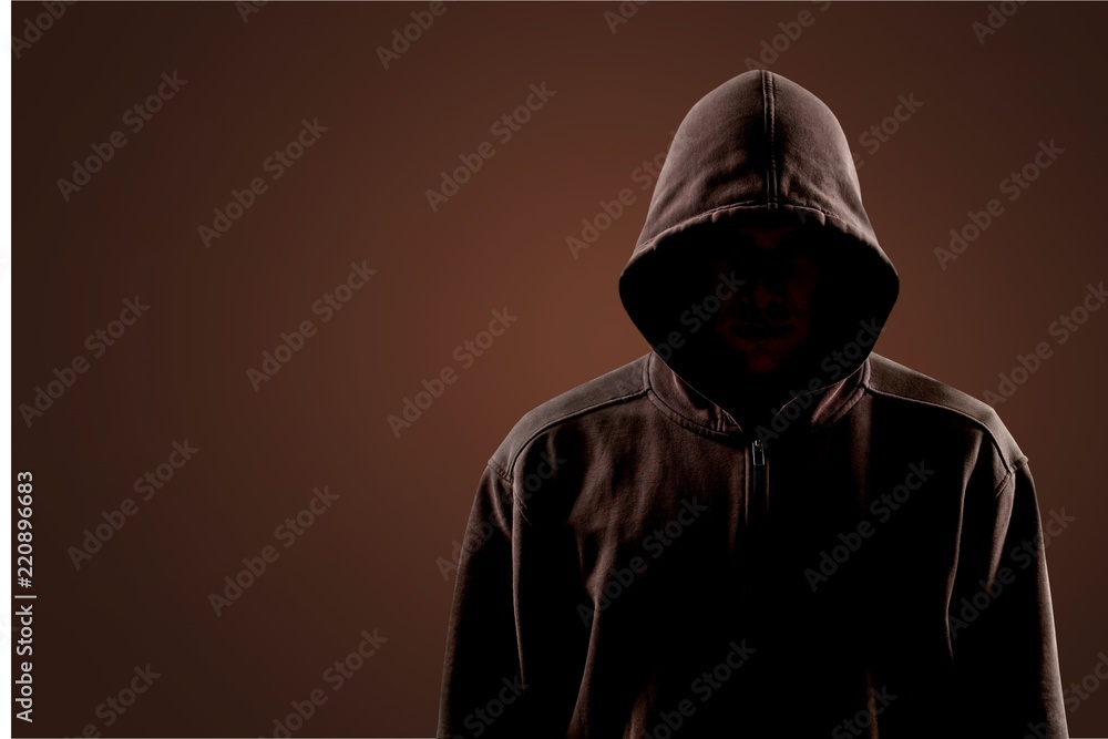 Sticker Dark unrecognisable man in hoodie on background