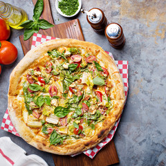 Breakfast pizza with bacon and vegetables
