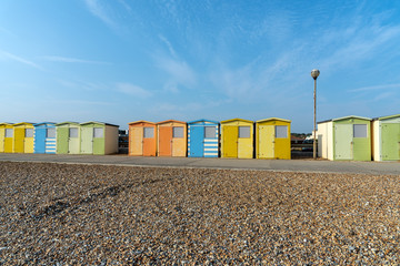 Fototapeta na wymiar Colorful beach cabins seen in Seaford, England