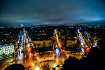 view from Arc de triomphe at night,Photo image a Beautiful panoramic view of Paris Metropolitan City