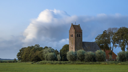 Fototapeta premium Church with tower in hamlet