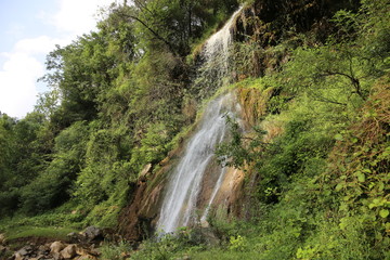 Fototapeta na wymiar Waterfall in mountains beautiful view in azad kashmir