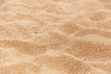 Fototapeta na wymiar wave of sand at sea beach texture pattern for nature background