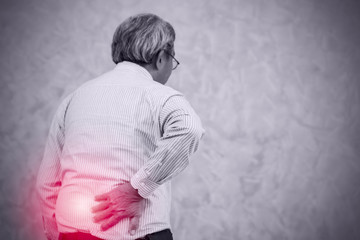 Asian chinese elder lower back pain from office syndrome