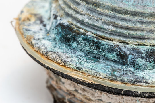 closeup pipe corrosion and copper sulfate rusty from water mineral erosion oxidation
