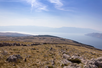 Mountain with sea and blue sky, island Krk Croatia