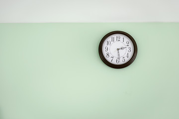 Classic clock on empty wall, Vintage tone