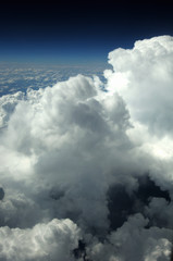 flight in an airplane above the clouds, the view from the Inside, skyline, sky line