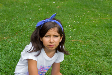 Messy Face Sweaty Serious Young Girl Wearing Bandana