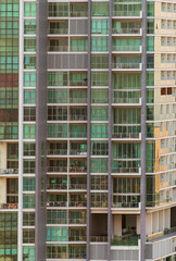 Fototapeta na wymiar texture of a skyscraper, walls of a high-rise building with windows