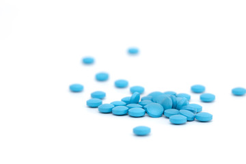 blue pills on white background