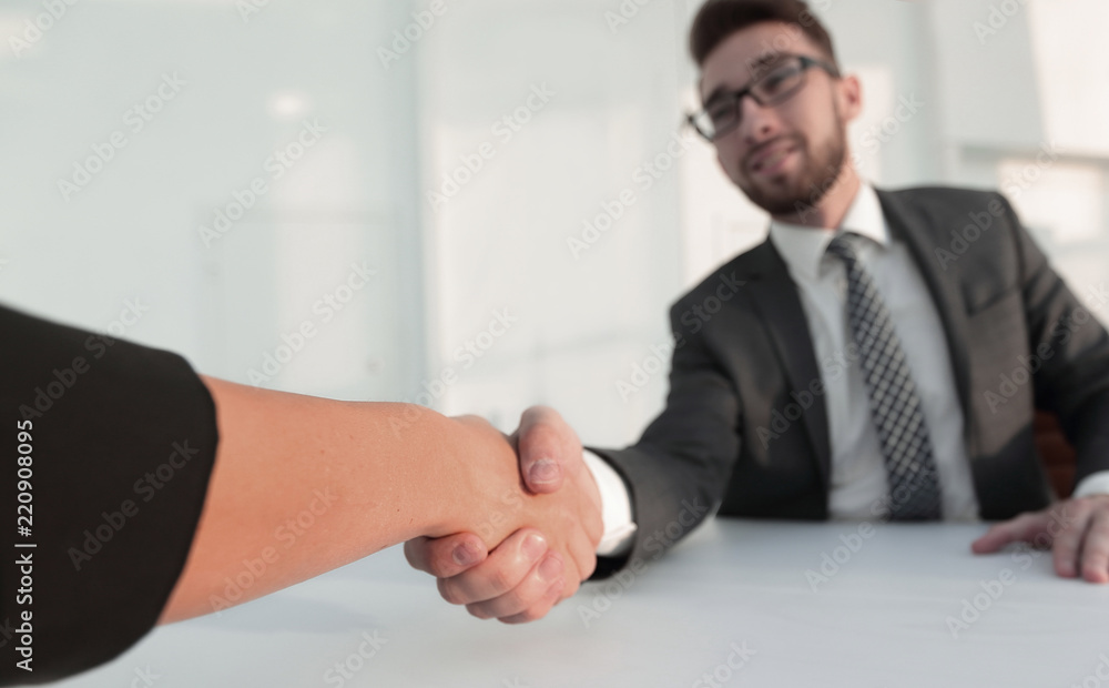 Wall mural successful businessmen handshaking after good deal.